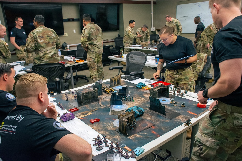 Students at the School of Advanced Military Studies enhance futures thinking, operational, tactical skills alongside successful wargame coach