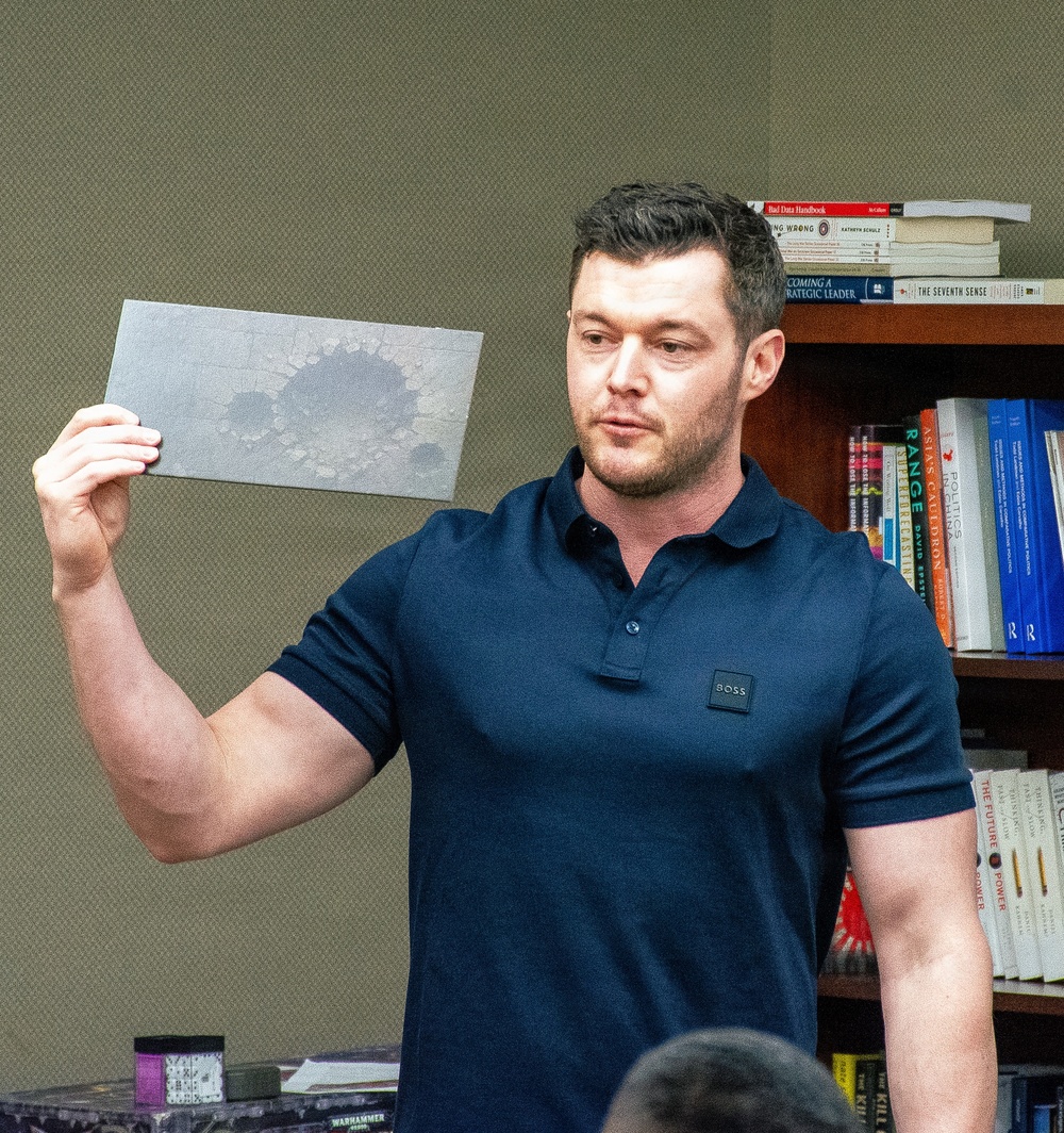 Students at the School of Advanced Military Studies enhance futures thinking, operational, tactical skills alongside successful wargame coach