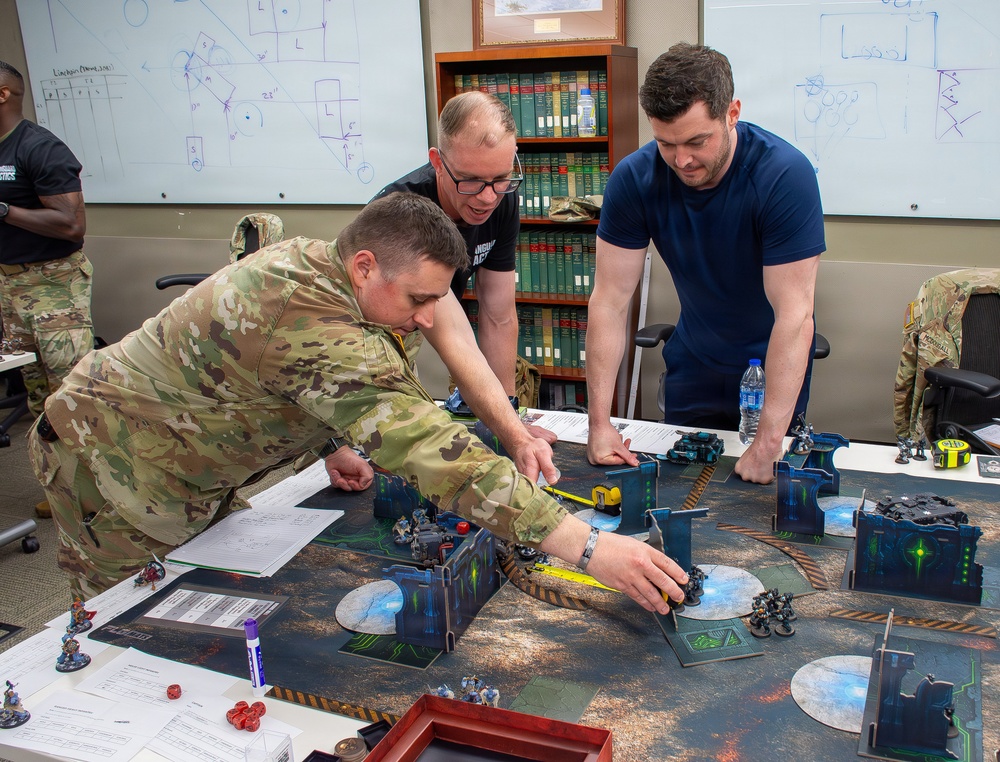Students at the School of Advanced Military Studies enhance futures thinking, operational, tactical skills alongside successful wargame coach
