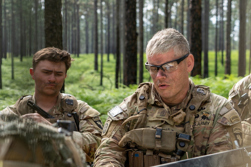1st Sgt. Anthony Buchanan briefs leaders during JRTC mission planning at Fort Polk