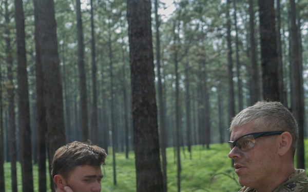 1st Sgt. Anthony Buchanan briefs leaders during JRTC mission planning at Fort Polk