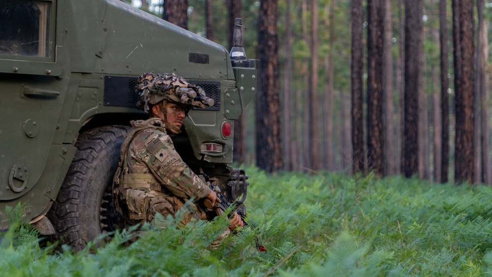 101st Airborne Division Soldier pulls security during JRTC