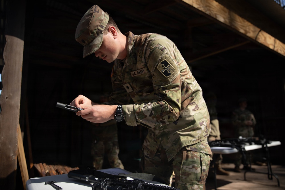 Soldier assembles M4.