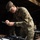 Soldier assembles M4.