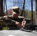 Maryland Army National Guard Soldier sets up a SINCGARS radio.
