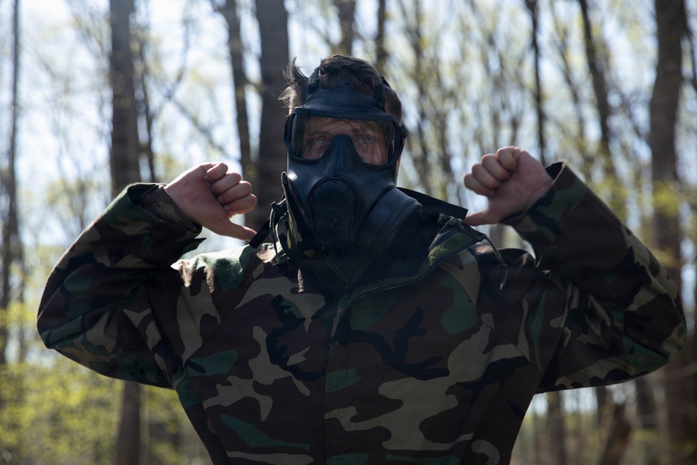 Maryland Guard Soldier dons MOPP 4 during the Maryland National Guard Best Warrior Competition.