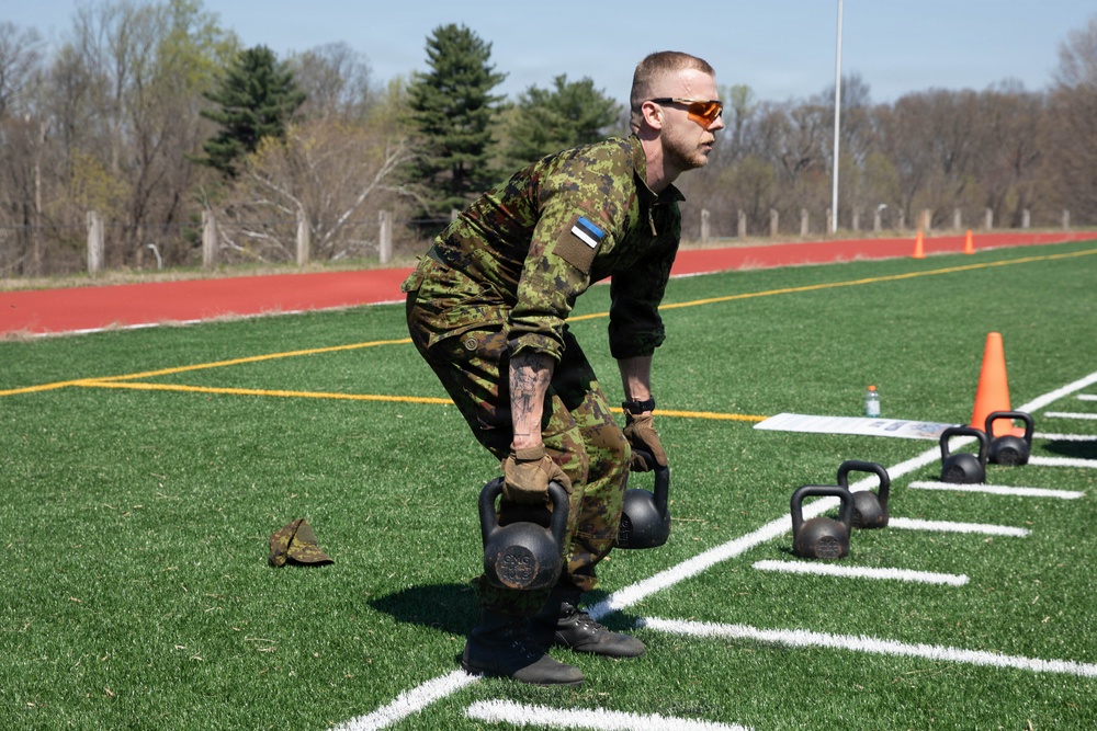 Estonia Defence Forces member preforms a squat.