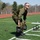 Estonia Defence Forces member preforms a squat.
