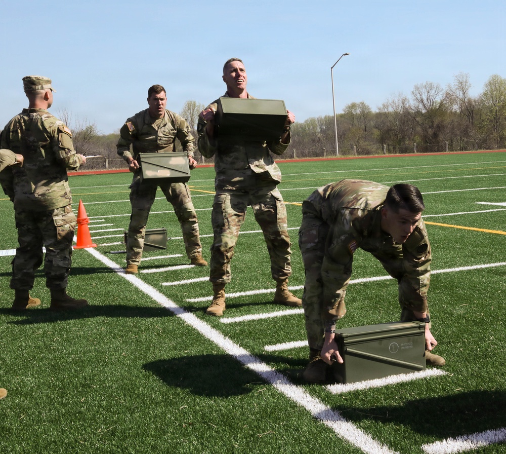 Soldiers perform the ammo can press