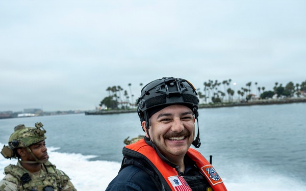 Coast Guard members conduct large vessel security boarding