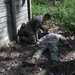 Soldier assesses a mock casualty