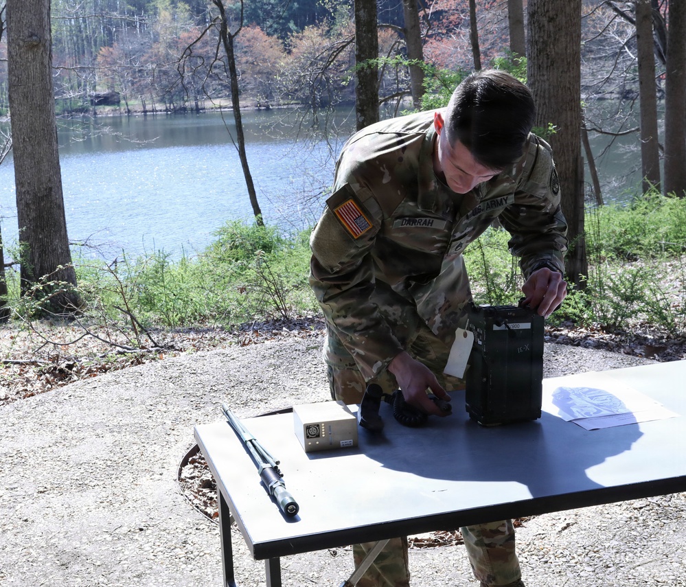 Soldier performs a radio check