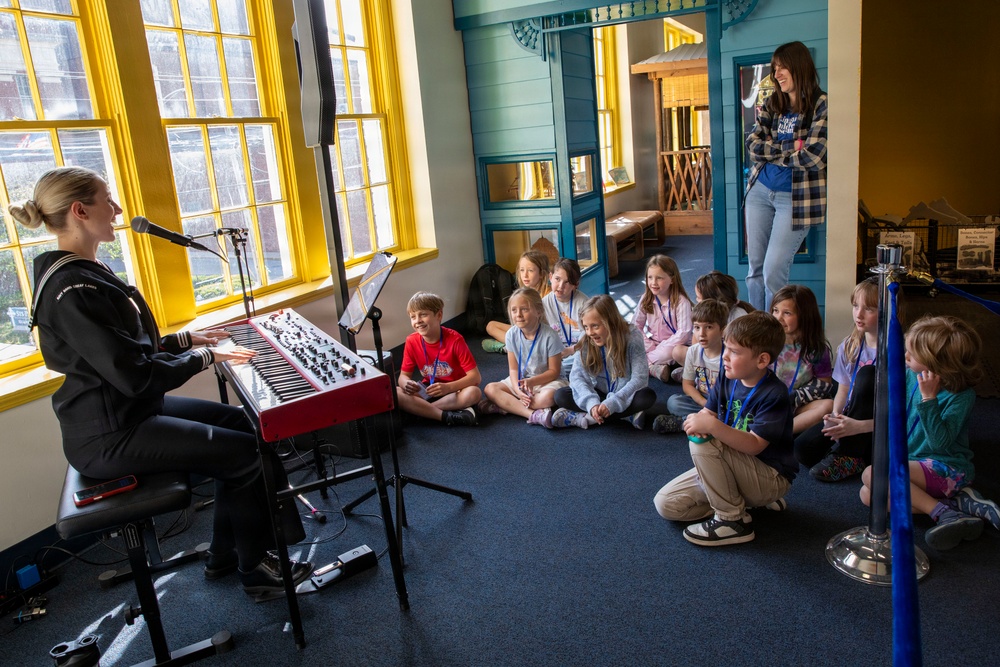 Sailor assigned to Navy Band Great Lakes preform at Lexington Children’s Museum