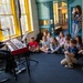 Sailor assigned to Navy Band Great Lakes preform at Lexington Children’s Museum