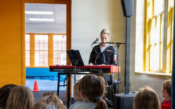 Sailor assigned to Navy Band Great Lakes preform at Lexington Children’s Museum