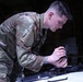Soldier performs weapons check