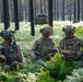 MFRC Soldiers discuss tactics and movement while training at JRTC