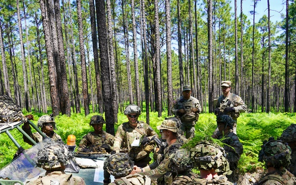 MFRC platoon leader briefs mission plat at JRTC