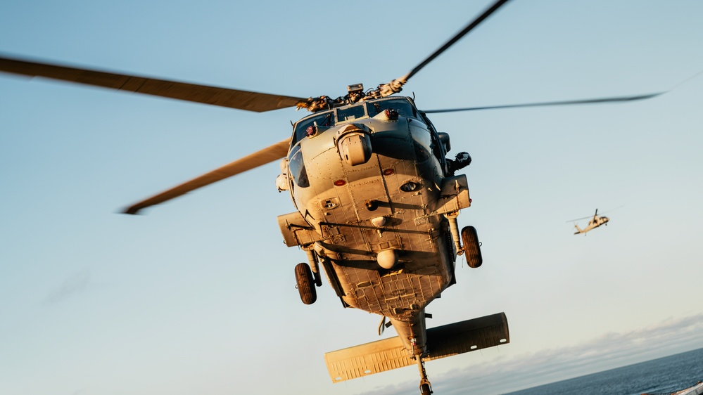 MH-60S Seahawks Transport Artemis II Crew Members to USS John P. Murtha