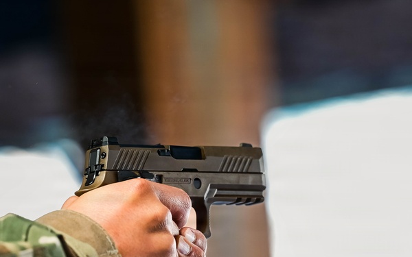 513th Air Control Group Airmen train with the M18 pistol