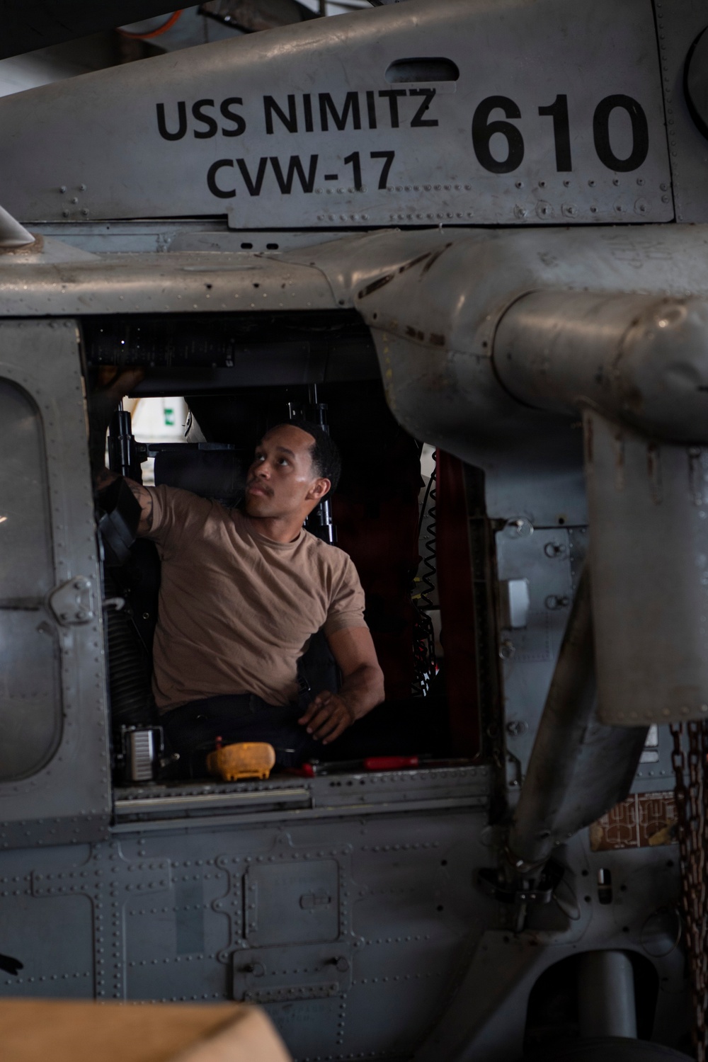 Sailor Conducts Maintenance