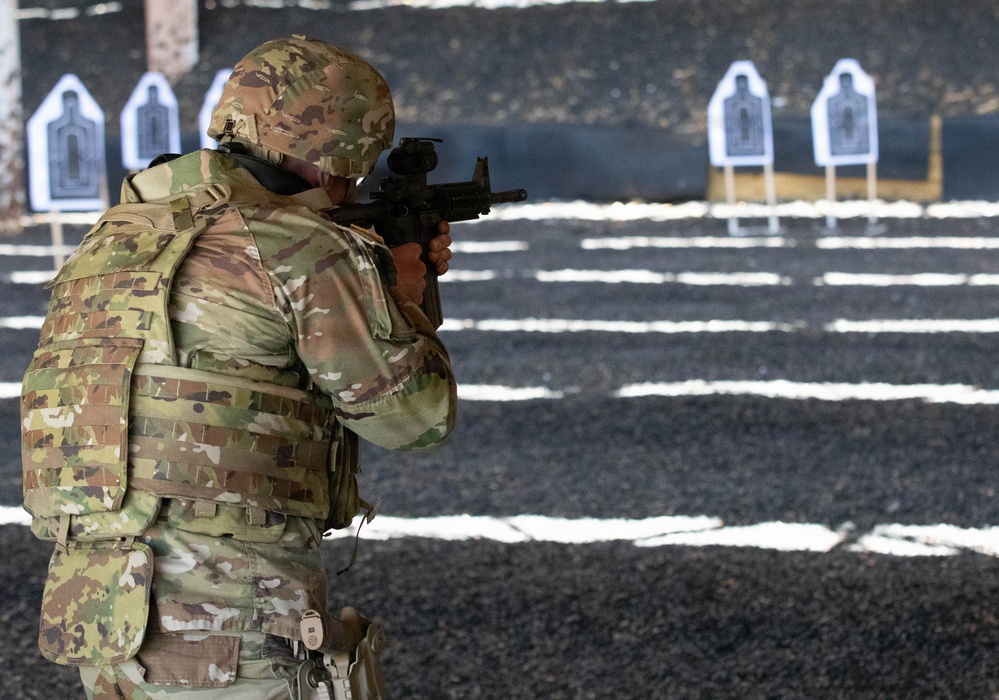 Competitor prepares to fire at target