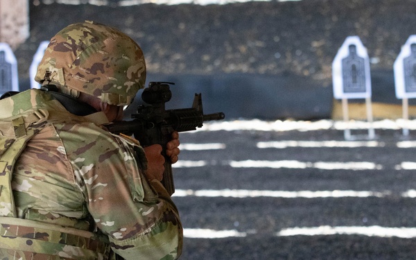 Competitor prepares to fire at target