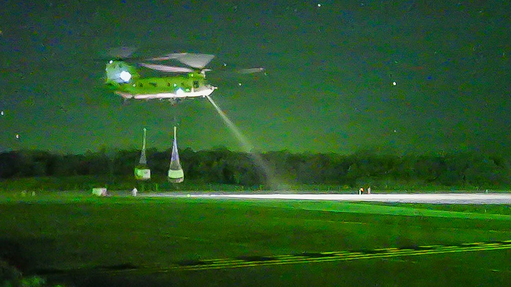 Soldiers conduct CH-47 Chinook resupply during nighttime JRTC operations