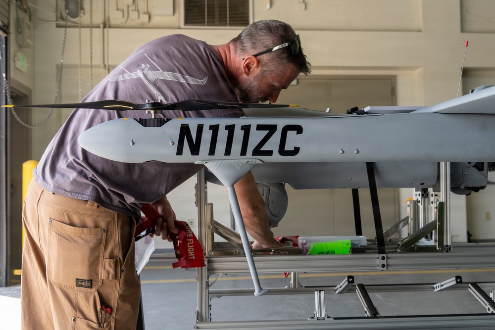 Civilian contractor prepares Aerosonde UAS for reconnaissance during JRTC rotation at Fort Polk