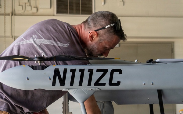 Civilian contractor prepares Aerosonde UAS for reconnaissance during JRTC rotation at Fort Polk
