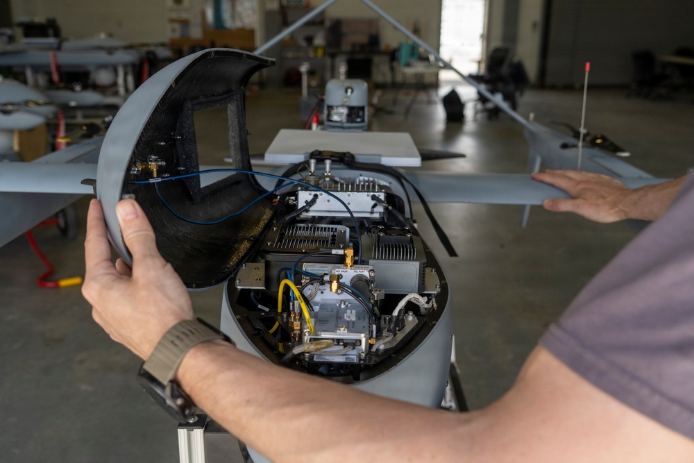 Civilian contractor prepares Aerosonde UAS for reconnaissance during JRTC rotation at Fort Polk
