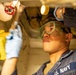 USS Mitscher (DDG 57) Sailor conducts maintenance
