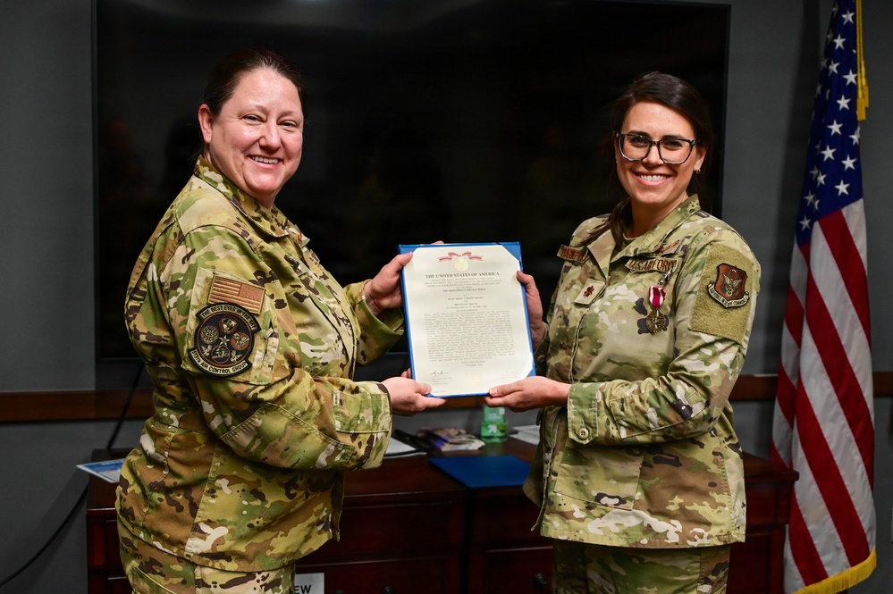 Maj. Chenoa Barker - Charles Awarded Meritorious Service Medal at Tinker Air Force Base