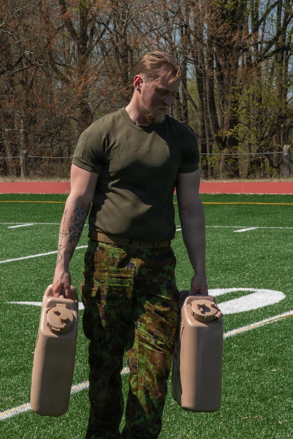 Estonian Soldier Performs Water Can Carry