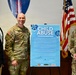 Col. Edward Sanford and Command Sgt. Maj. Chris Melendez sign the Child Abuse Prevention Month Proclamation