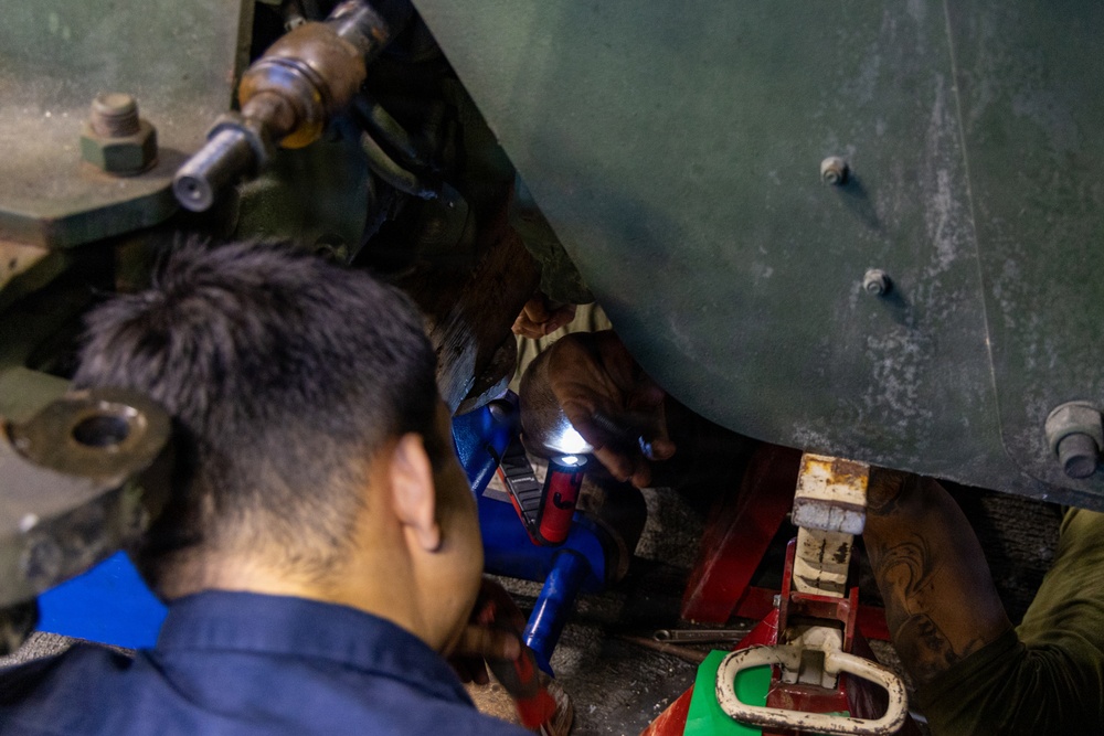 22nd MEU (SOC) | CLB 26 Marines Conduct Maintenance on an Extended Boom Forklift