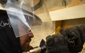 Ronald Regan Sailors and Contractors Conduct Maintenance