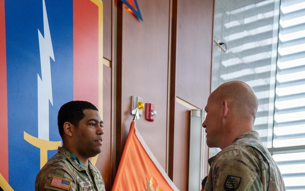 Soldier receives award for top 3 by LTC Vanwinkle