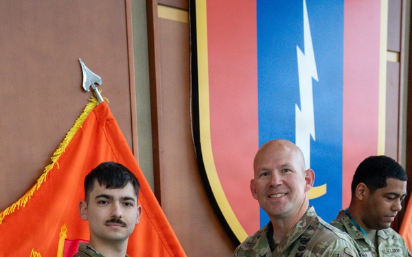 Soldier receives award from LTC Vanwinkle