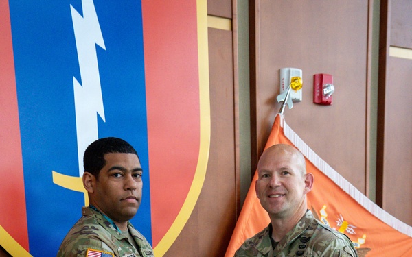 LTC Vanwinkle presents award to top 3 soldier