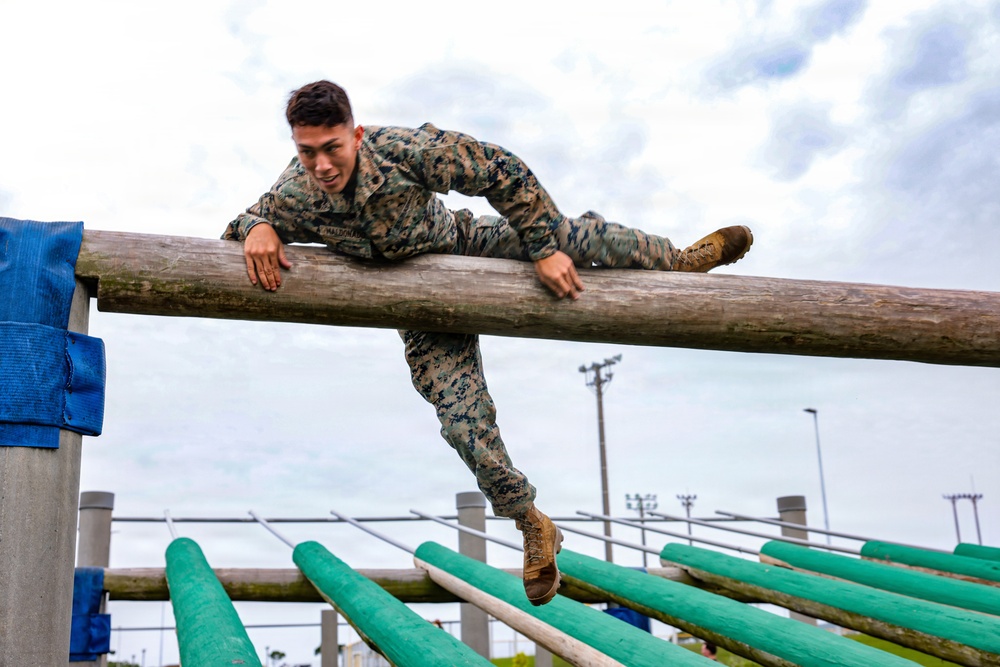 U.S. Marines conduct obstacle course during Communication Strategy and Operations Field Training Exercise on Okinawa