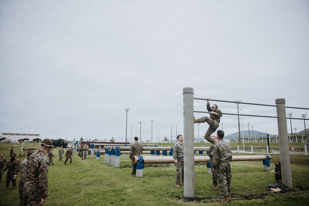 U.S. Marines tackle obstacle course during communication strategy and operations field training exercise