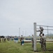U.S. Marines tackle obstacle course during communication strategy and operations field training exercise