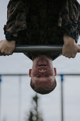 U.S. Marines tackle obstacle course during communication strategy and operations field training exercise