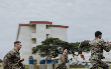U.S. Marines tackle obstacle course during communication strategy and operations field training exercise