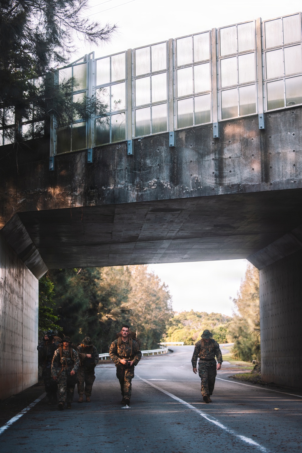 U.S. Marines conduct hike during communication strategy and operations field training exercise