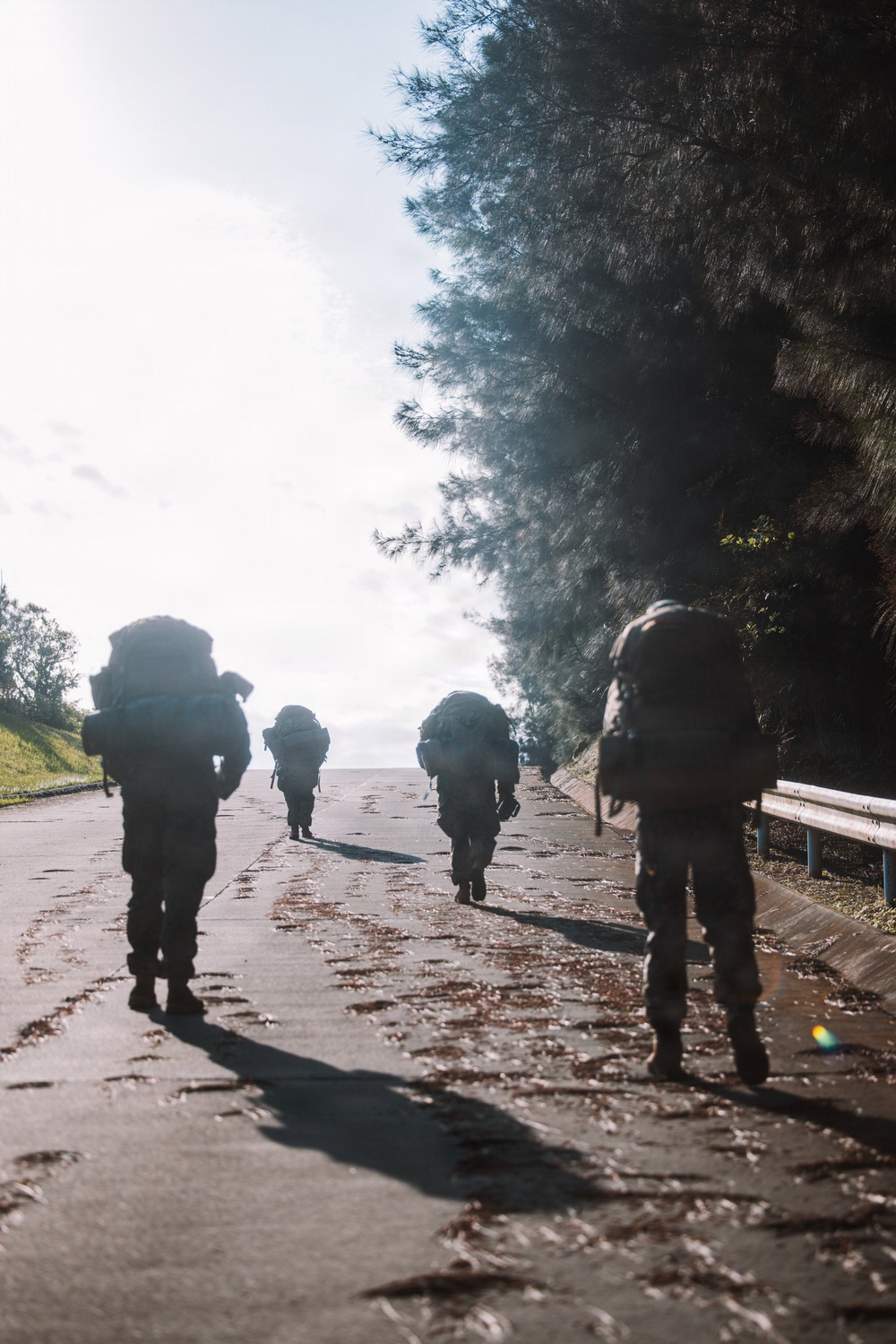 U.S. Marines conduct hike during communication strategy and operations field training exercise