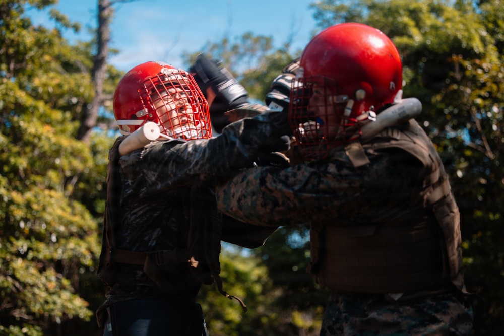 U.S. Marines conduct hike during communication strategy and operations field training exercise