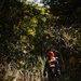 U.S. Marines conduct hike during communication strategy and operations field training exercise