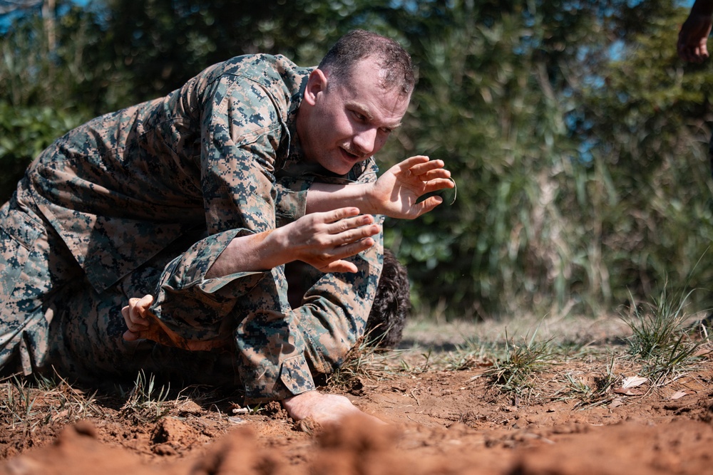 U.S. Marines conduct hike during communication strategy and operations field training exercise
